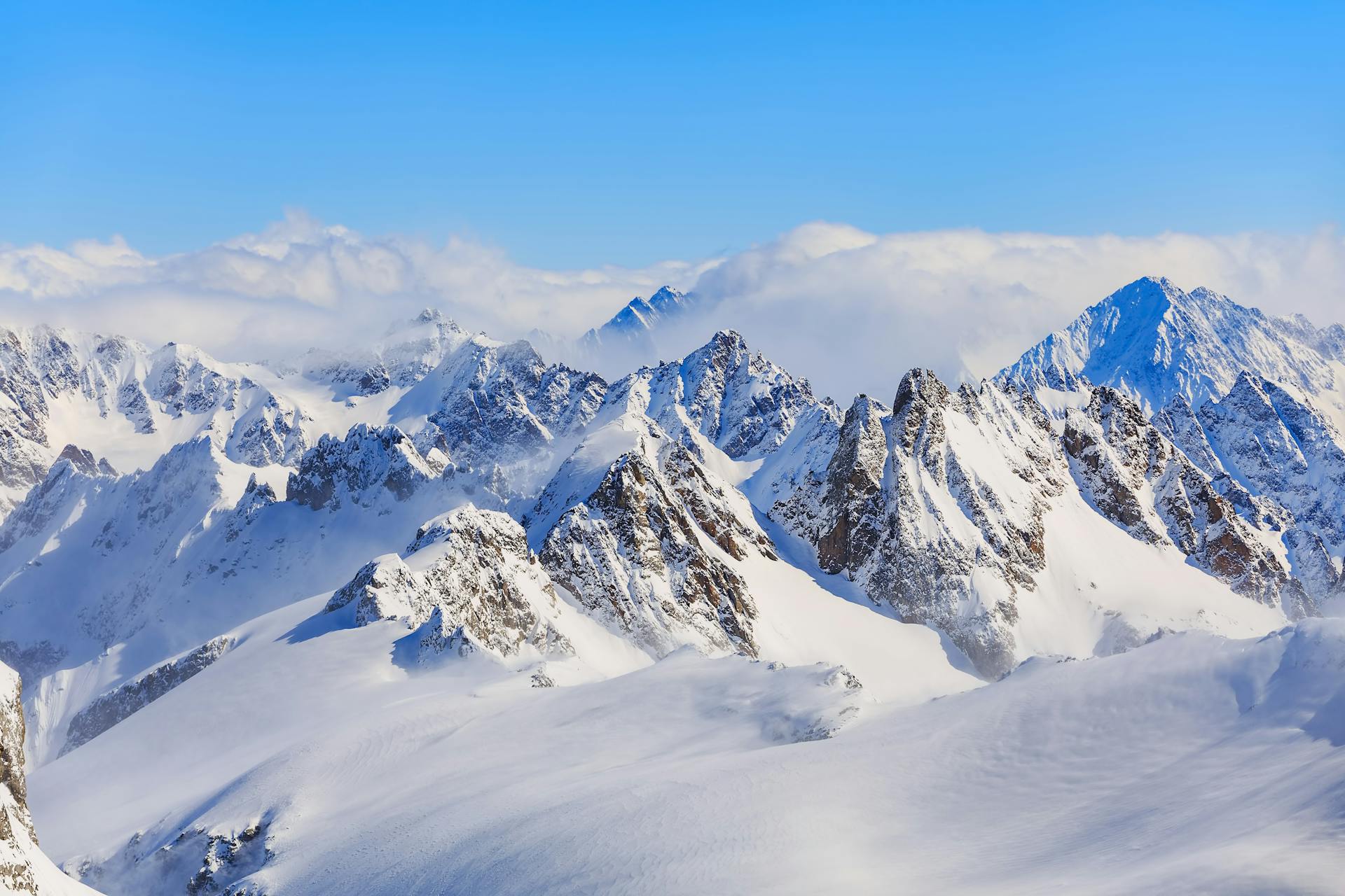 Mountain ski resort with snow-covered peaks